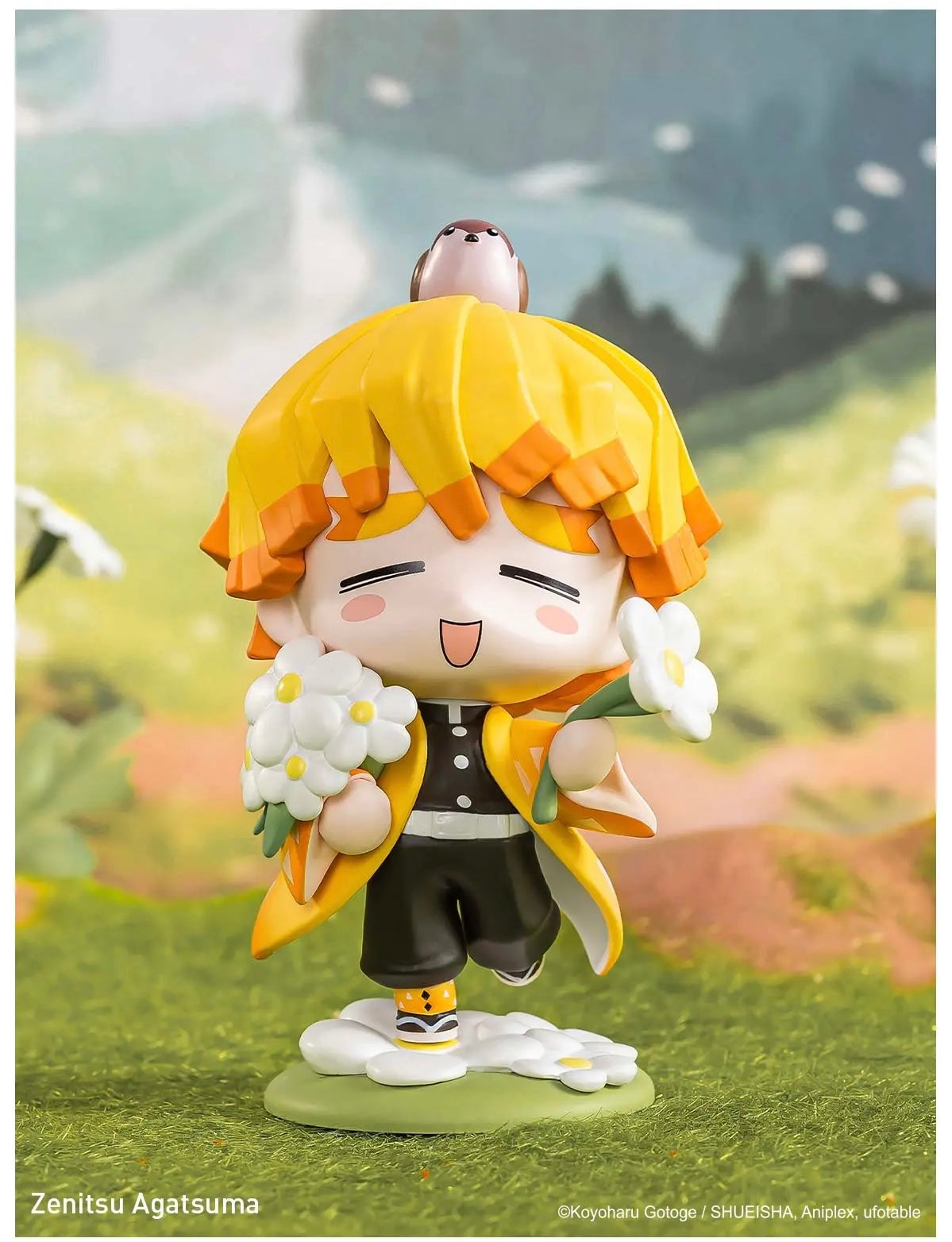 Figurine of Zenitsu Agatsuma with a bird on his head, set against a blurred natural background. popmart demon slayer