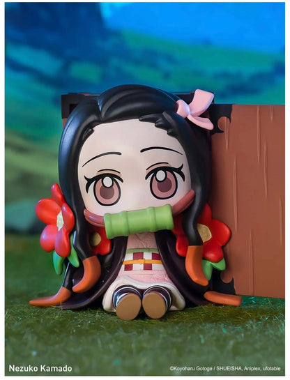 Figurine of Nezuko Kamado from Demon Slayer with a scenic background popmart  demon slayer