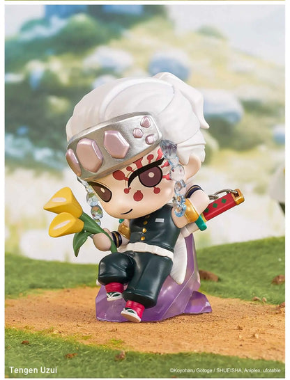 Toy figure of Tengen Uzui from 'Naruto' series holding a flower on a grassy background POPMART Demon Slayer