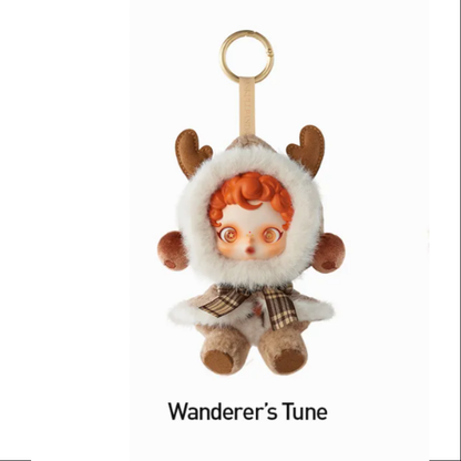 Plush keychain with a character wearing a white fur hood and brown ears on a white background. POP MART POP MART SKULLPANDA Winter Symphony Series Plush blind box — Wanderer’s Tune (brown) — Kuwait — سكل باندا ونتر سنفوني- بوب مارت